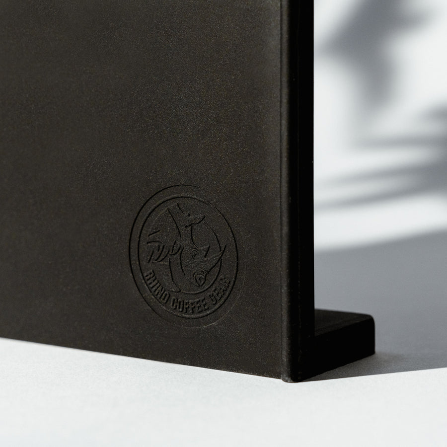 Rhino pressed logo on tamping mat